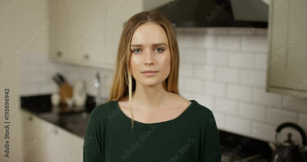4K Young woman nodding & looking disinterested during very boring video call 4K Young woman nodding & looking disinterested during very boring video call