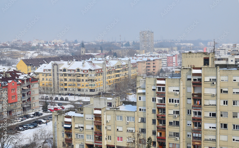 Residential buildings at the end of a winter during a day