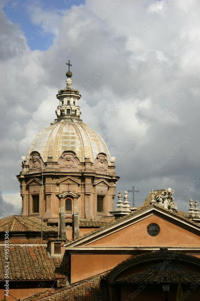 sky with gray clouds and roofs of the Rome Italy