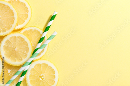 slices of lemon on yellow background