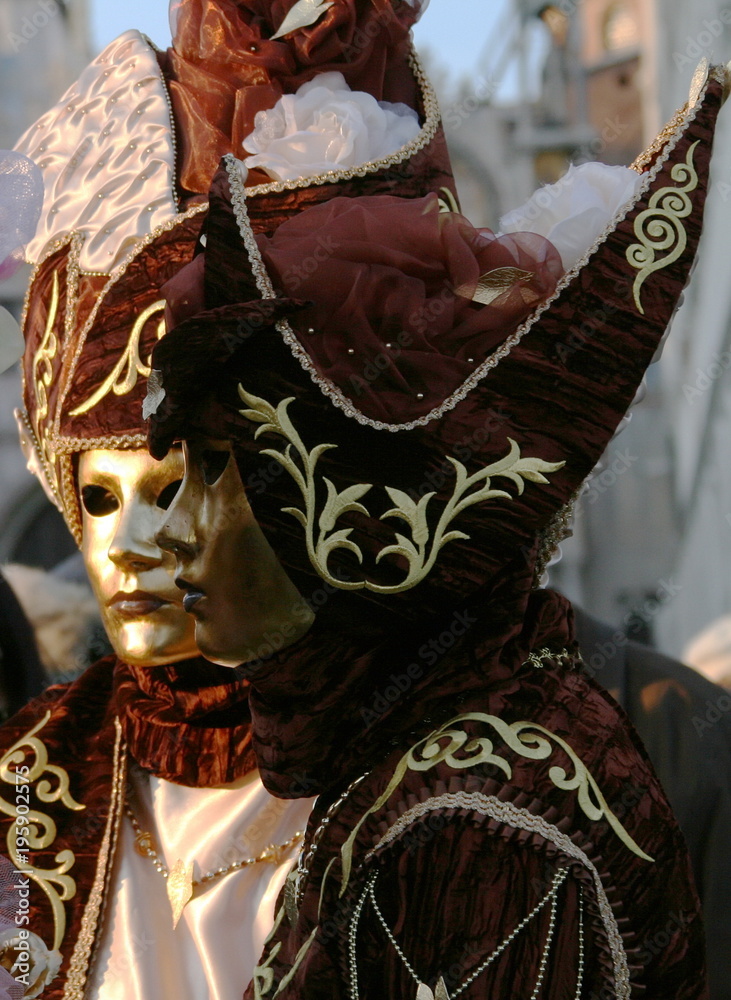 gold masks at the Venice carnival Italy