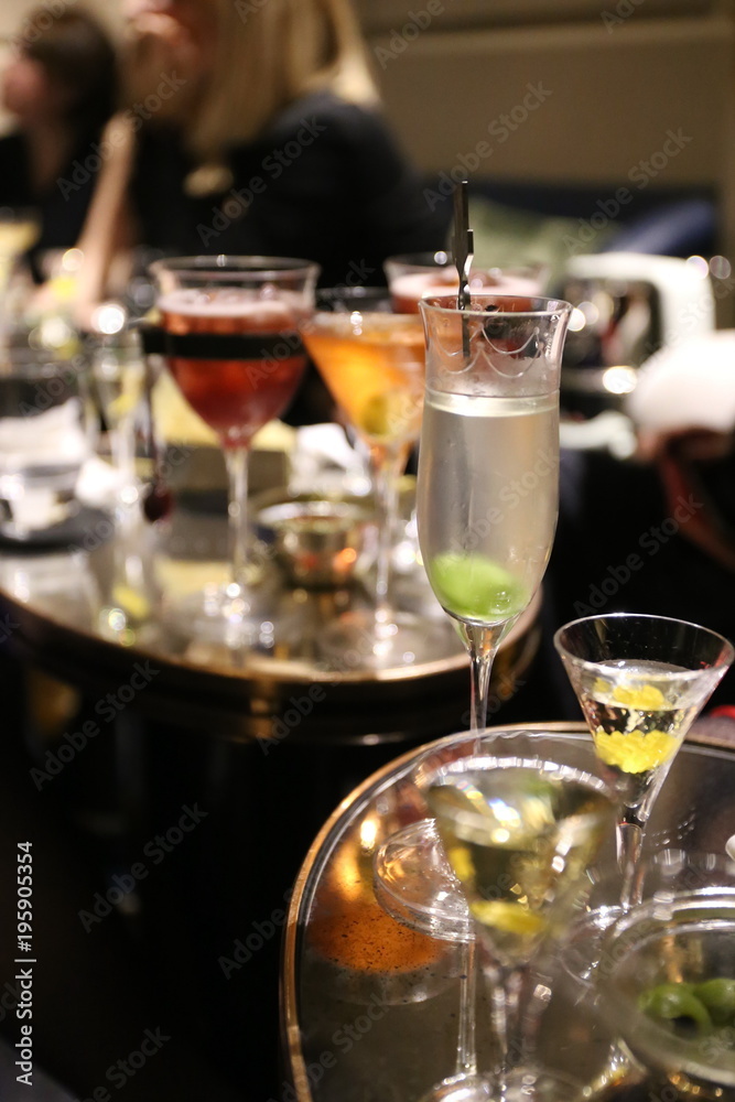 alcohol cocktails in glass in bar during the party