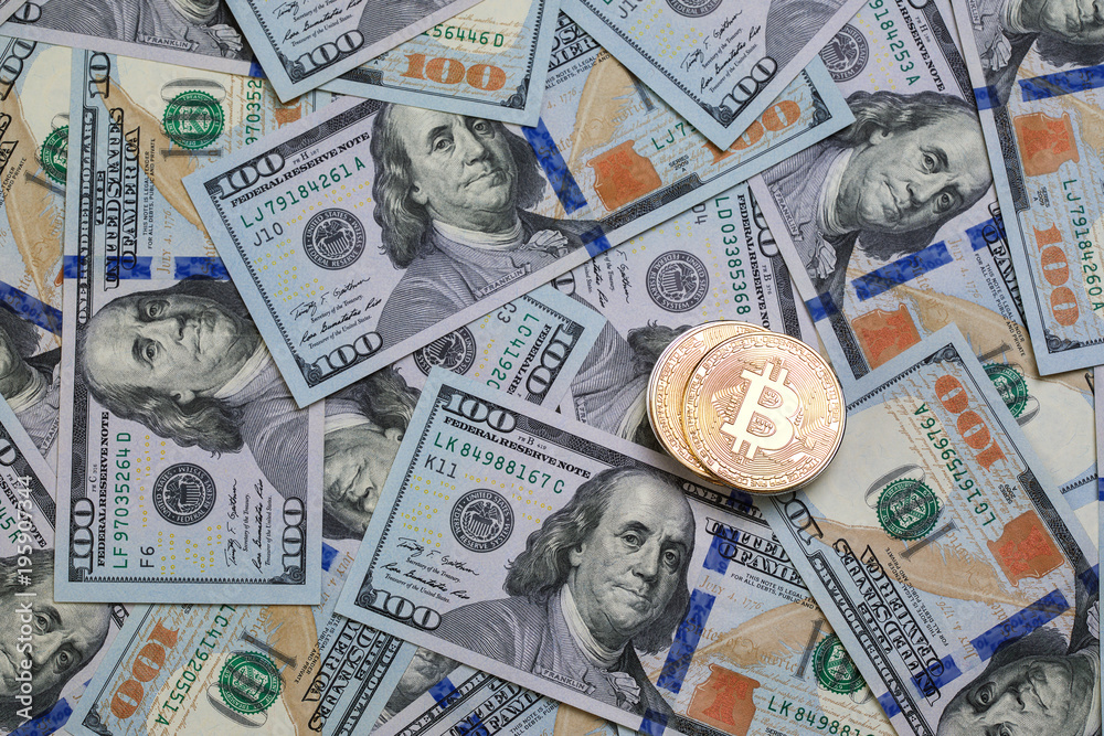 Golden bitcoin on hundred dollars abstract background. Crypto-currency. Golden bitcoin on hundred dollars abstract background. Crypto-currency.