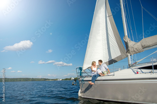 couple in love on a yacht. engagement. © velimir