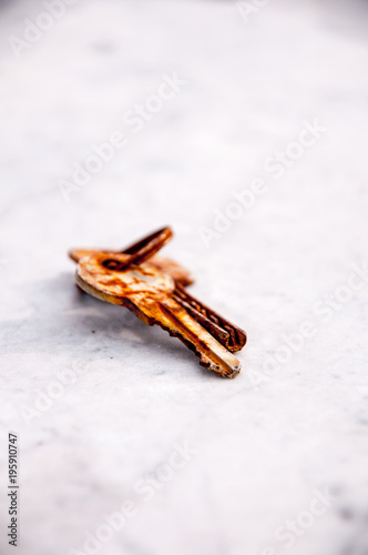 rusty key on mermer background photo