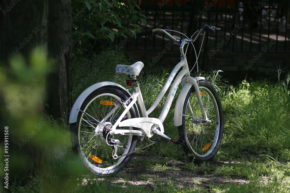 white bicycle in the park 
