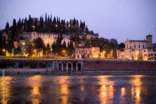 Beautiful scenic view of hill with Castel San Pietro at sunset