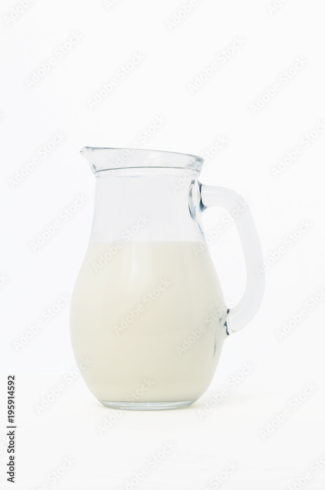 glass jug with milk, on white background glass jug with milk, on white background