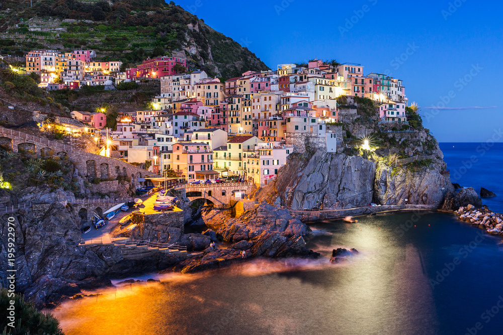 Night view of Manarola. Cinque Terre. It is the second smallest town of the famous Cinque Terre towns. Liguria, Italy.