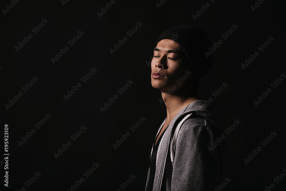 Portrait of young asian boy with closed eyes. Portrait of young asian boy with closed eyes.