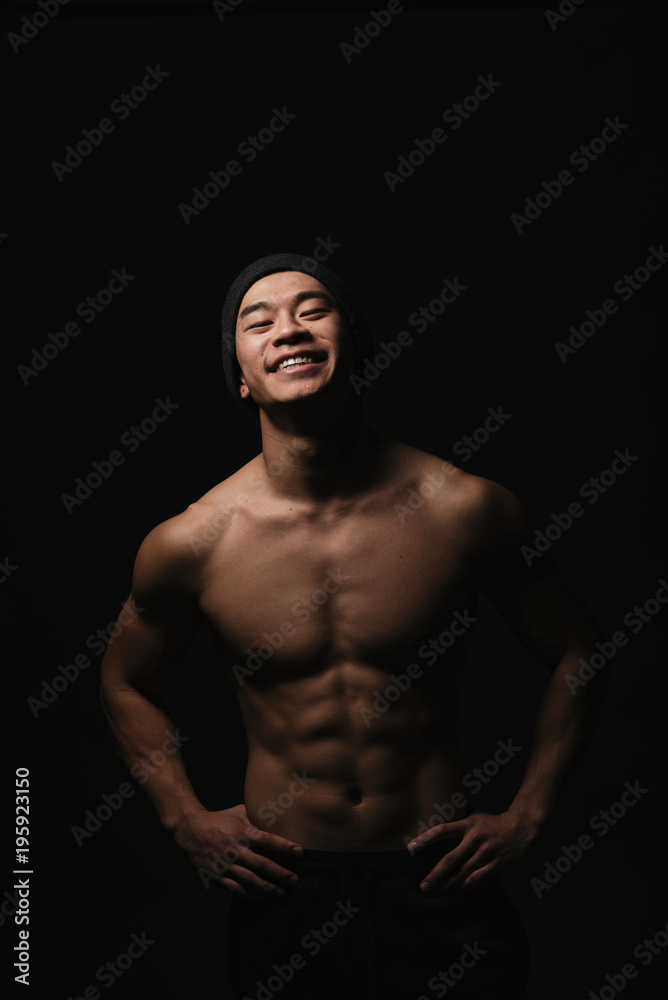 Portrait of young asian boy with fitness body.