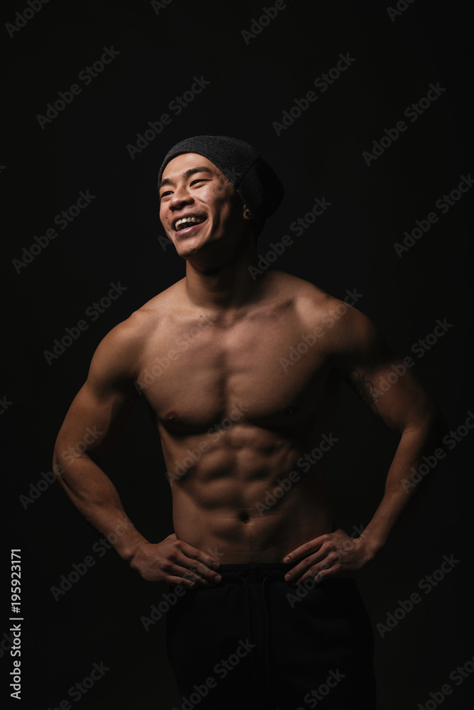Portrait of young asian boy with fitness body.