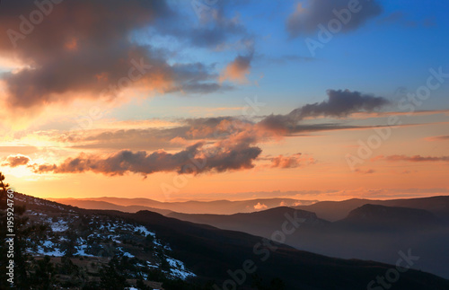 Warm sunset in wintry mountains  Crimea