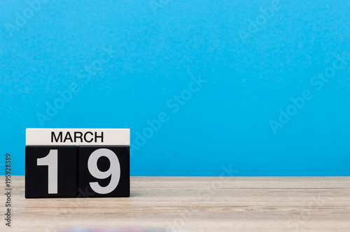 March 19th. Day 19 of march month, calendar on light blue background. Spring time, empty space for text, mockup