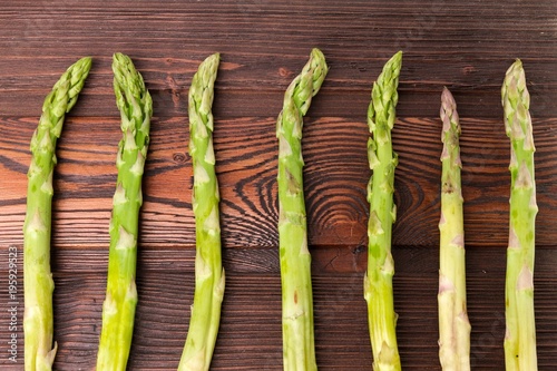 asparagus on wooden background photo