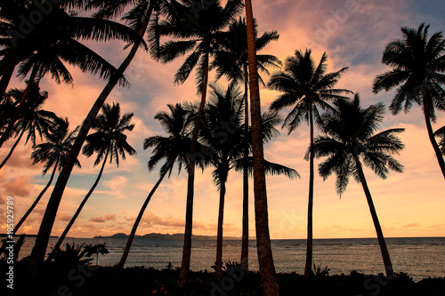 Colorful sunrise on the beach in Lavena village in Taveuni Island, Fiji