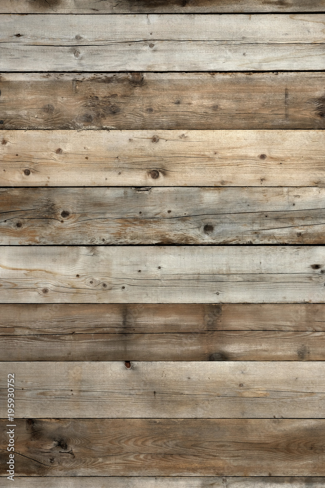 Naklejka premium Old dark vintage weathered distressed wood wall plank grain background texture photo vertical