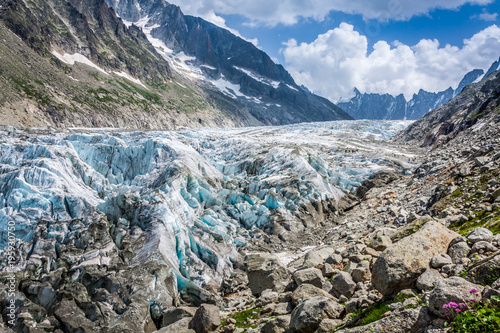 View on Argentiere glacier. Hiking to Argentiere glacier with the view on the massif des Aiguilles Rouges in French Alps
