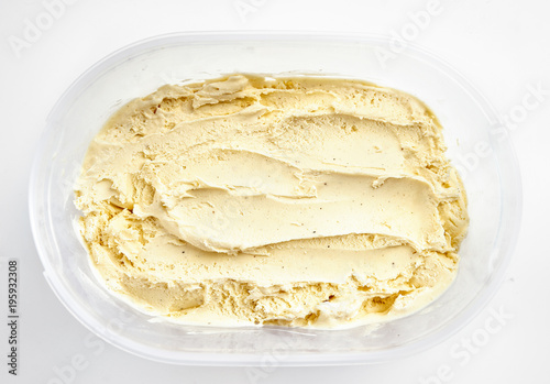 Top view of vanilla ice cream in plastic box