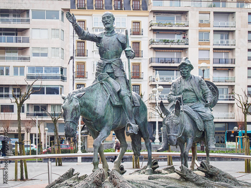 SAN SEBASTIAN, SPAIN-FEBRUARY 8, 2018: Don Quixote and Sancho Panza Sculpture by Lorenzo Coullaut - Valera photo
