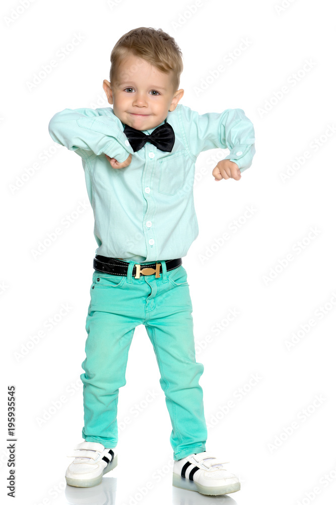 The little boy is emotionally waving his arms. The little boy is emotionally waving his arms.