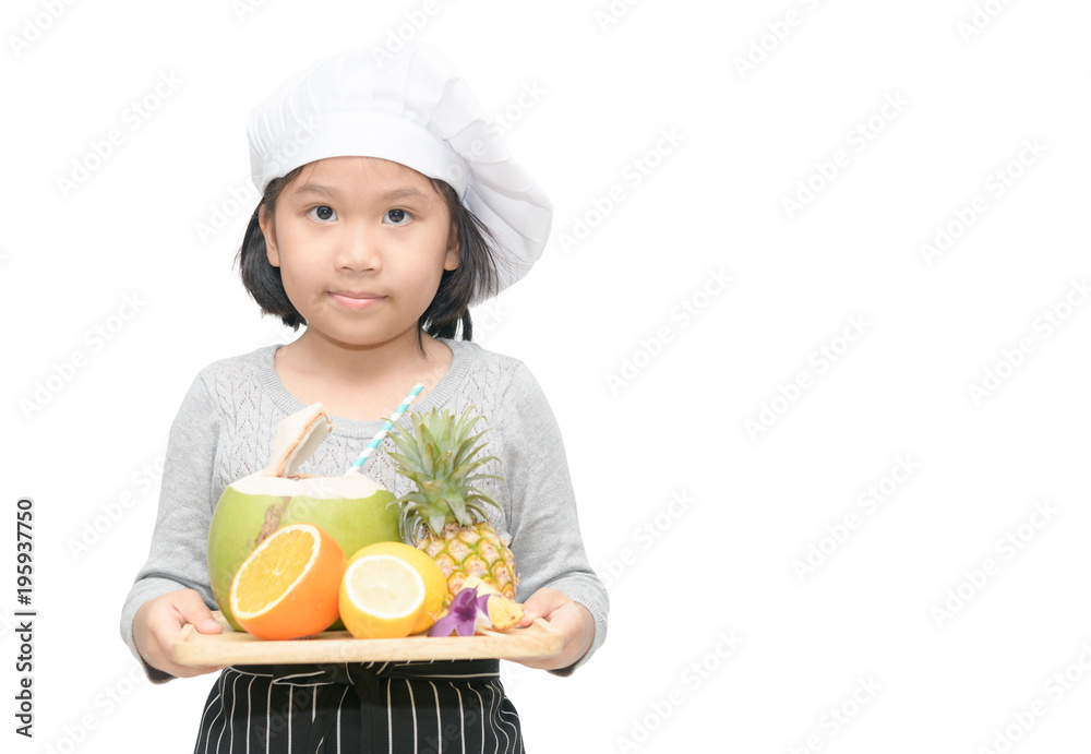 Portrait of cute girl chef with mix fruits, orange, coconut and pineapple and cook hat, apron stand and smile isolated on white background. Portrait of cute girl chef with mix fruits, orange, coconut and pineapple and cook hat, apron stand and smile isolated on white background.