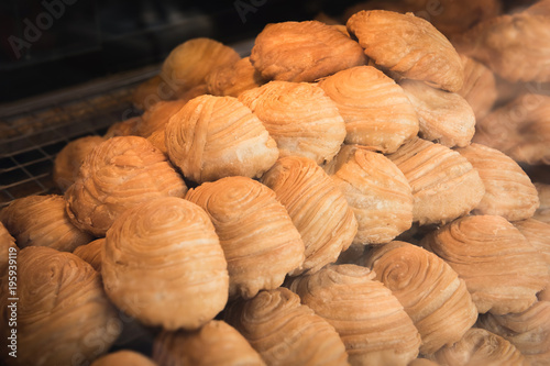 Curry puffs are a very popular snack item to have been adapted from Amphoe Muak Lek, Saraburi province in central Thailand