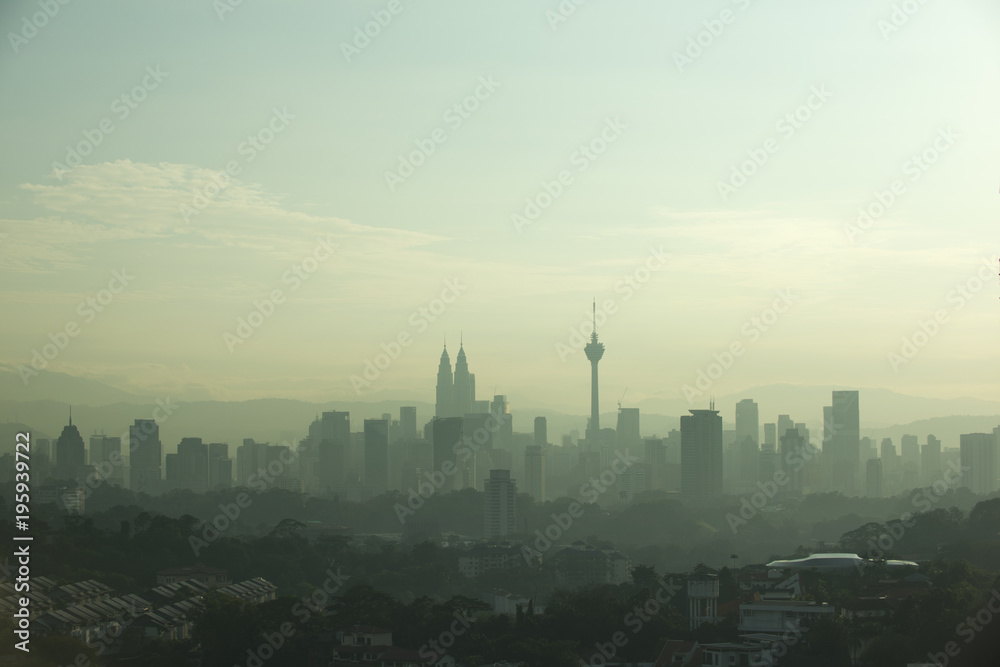 kuala lumpur morning skyline view with fog