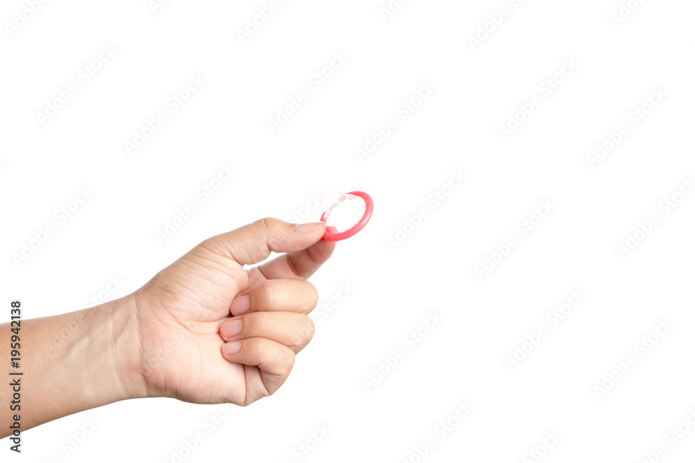 Hand holding condom Hand holding condom