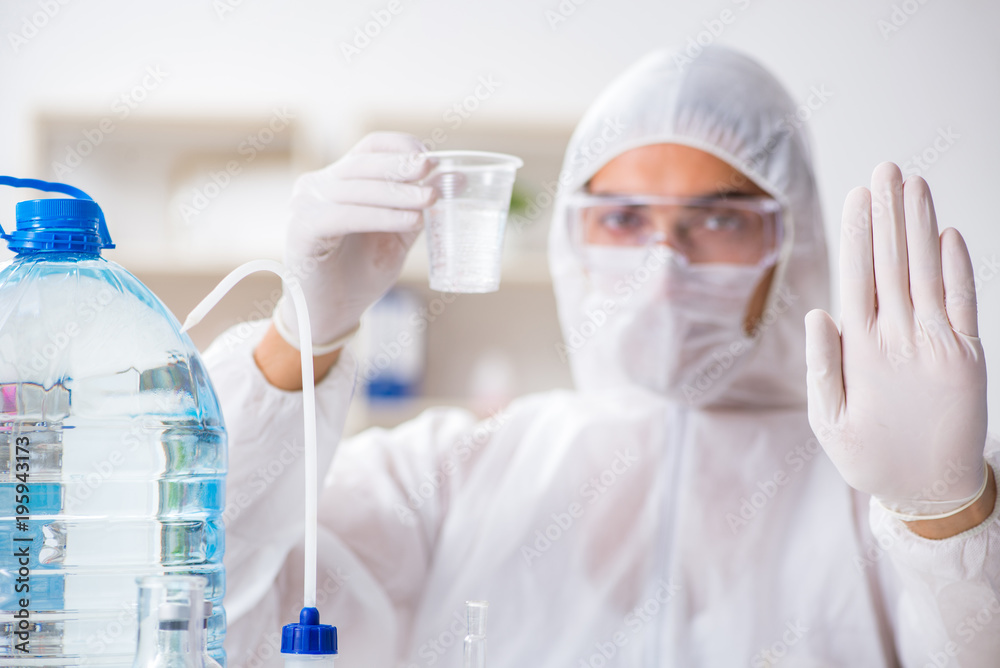 Lab assistant testing water quality Lab assistant testing water quality