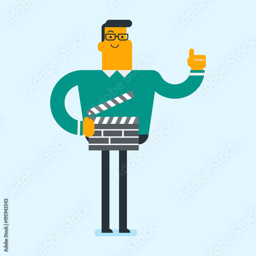 Young caucasian man holding a camera slate for the filming