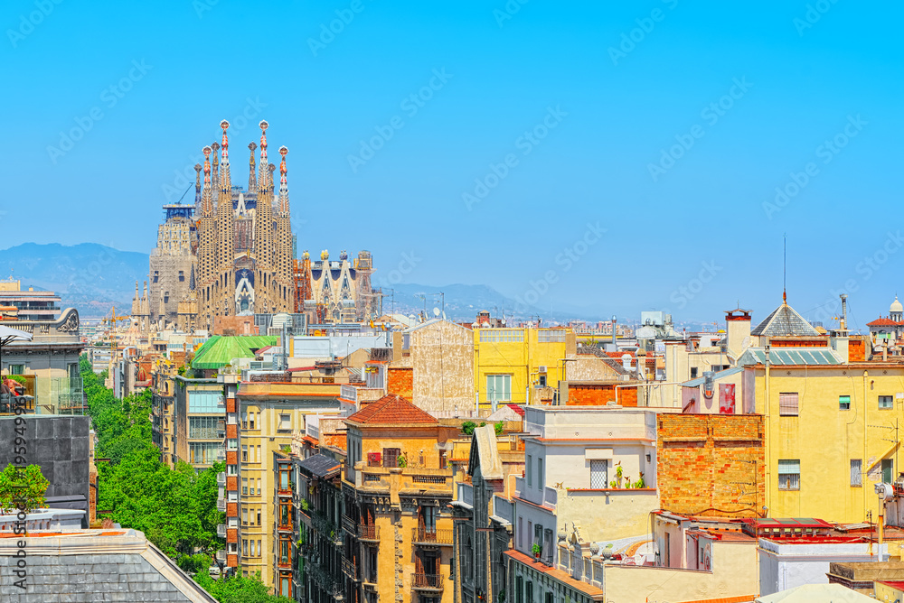 Basilica of La Sagrada Familia against blue sky. Creations of th