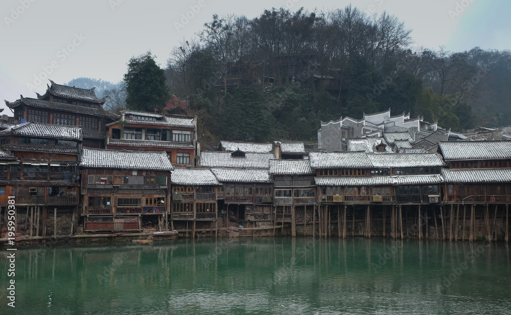 Phoenix Ancient Town - Fenghuang old town with green river.