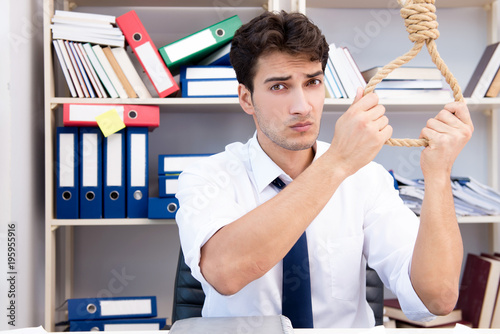 Busy frustrated businessman angry in the office