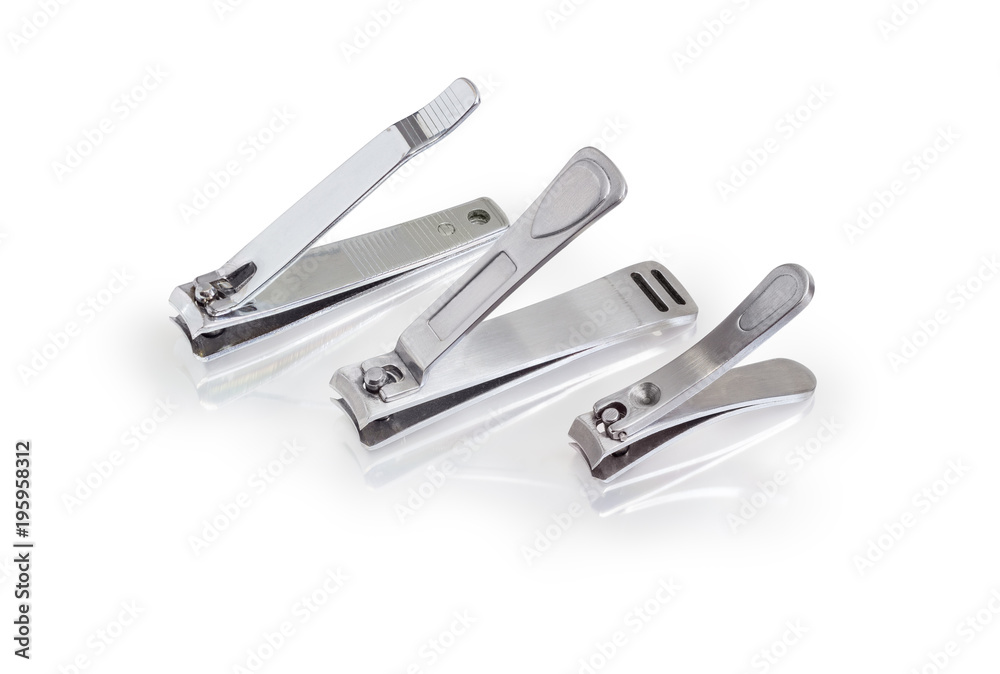 Three different nail clippers on the matte surface Three different nail clippers on the matte surface