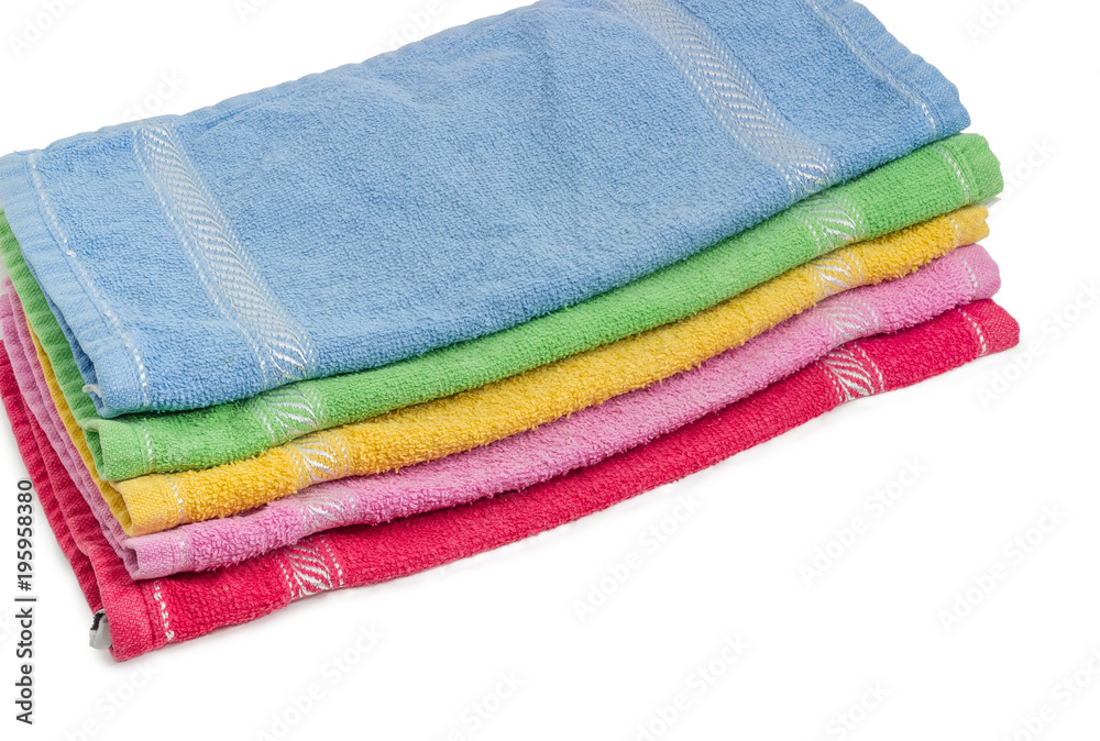 Set of the folded multicolored terry napkins closeup Set of the folded multicolored terry napkins closeup