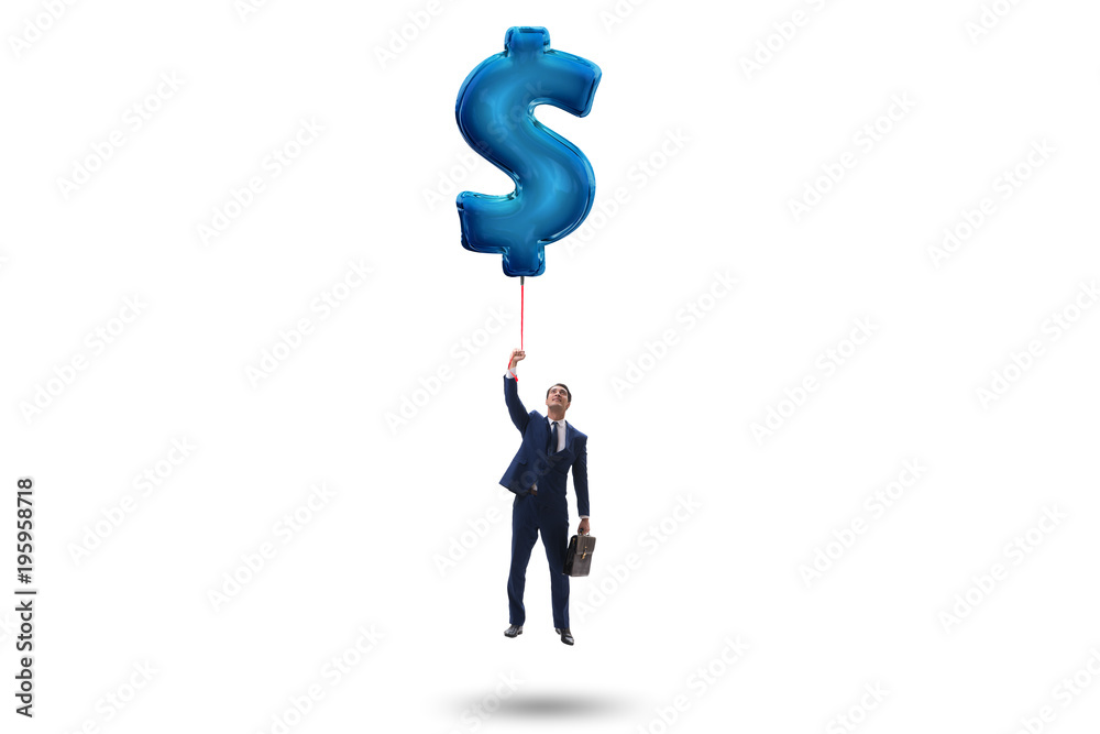 Businessman flying on dollar sign inflatable balloon Businessman flying on dollar sign inflatable balloon