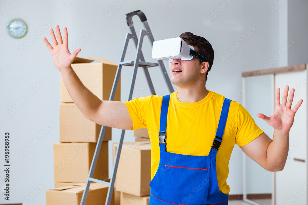 Painter contractor working with virtual reality goggles Painter contractor working with virtual reality goggles