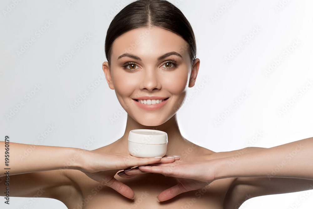 Forever young. Portrait of excited young woman presenting cosmetology for skin treatment. Forever young. Portrait of excited young woman presenting cosmetology for skin treatment.