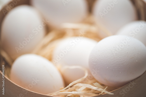 Close-up view of raw chicken eggs photo