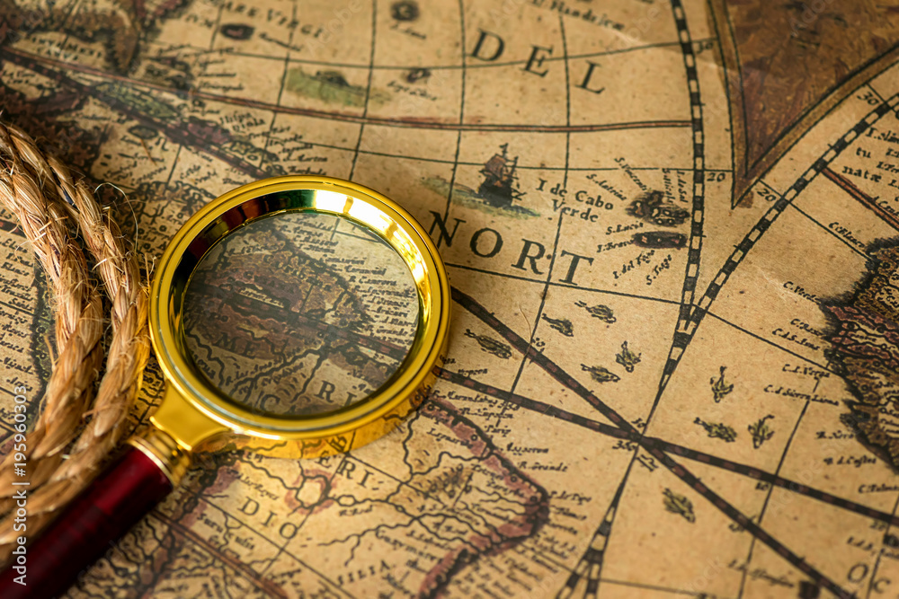 Retro magnifier with old map Retro magnifier with old map