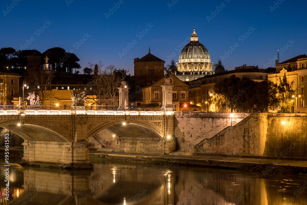 Rome at night with St. Peter Basilica in Vatican visible