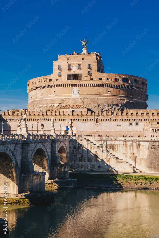 View of Sant Angelo Castle and Sant Angelo Bridge over Tiber River in Rome, Italy