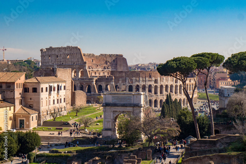 Canvas Print Titus Arch and the Roman Colosseum in Rome, Italy as seen from the Palatine Hill