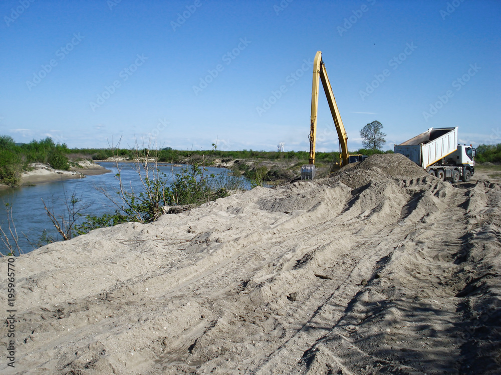 Fototapeta premium Truck unload sand