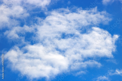 White clouds against blue sky. Sky background © Vladimir Zhupanenko