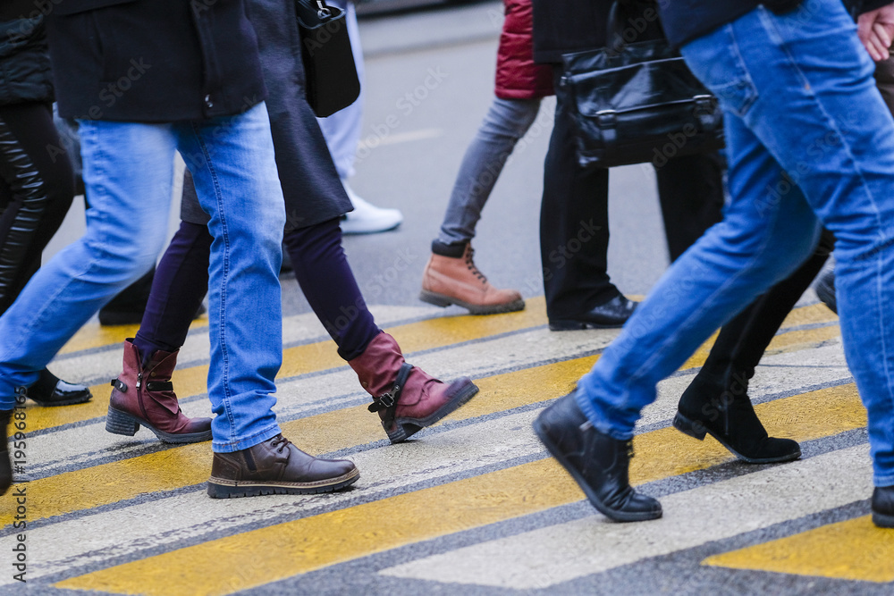 Pedestrians cross the road