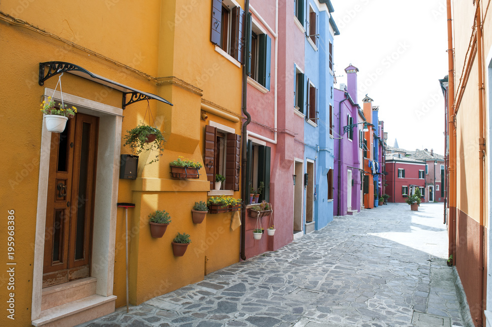 Venice, Burano island, Italy - typical street with colorful houses