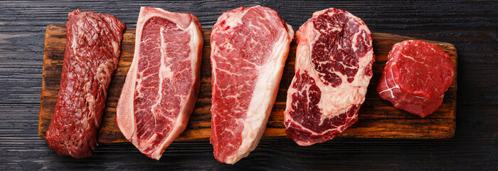Fototapete Steakhouse Rohe Black Angus Steak Auswahl  © Natalia Lisovskaya