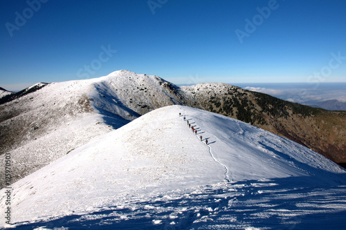 Hikers back from Midzhur Peak. The Peak is the highest in Serbia and one of the highest in Bulgaria photo